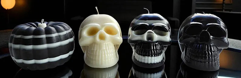 Halloween skull candles and pumpkins