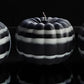 Halloween skull candles and pumpkins