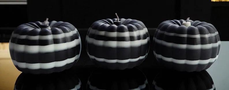 Halloween skull candles and pumpkins