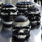 Halloween skull candles and pumpkins