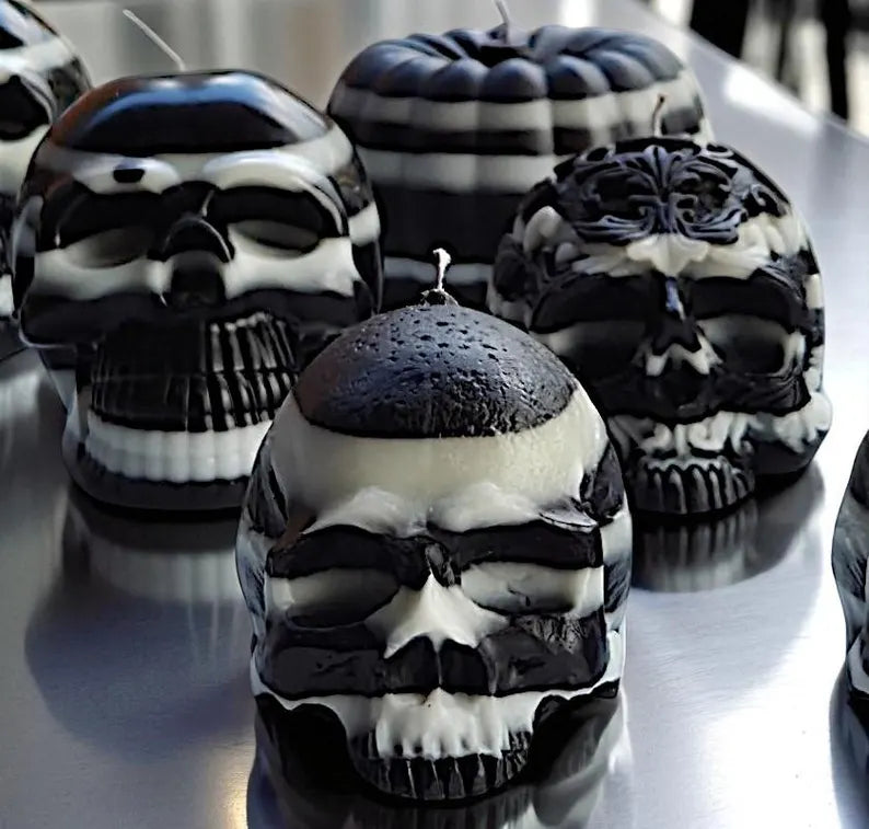 Halloween skull candles and pumpkins