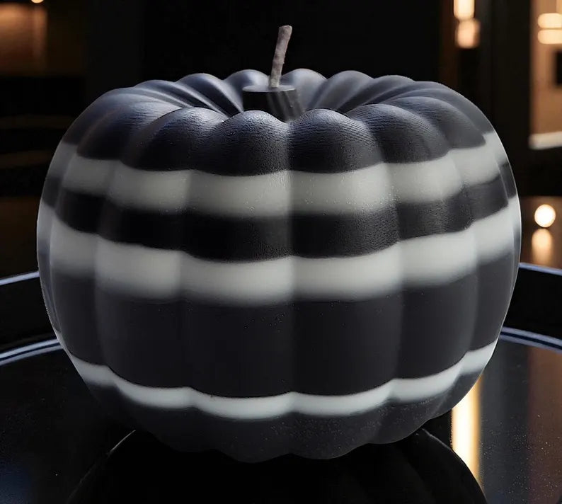 Halloween skull candles and pumpkins