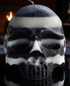 Halloween skull candles and pumpkins