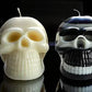 Halloween skull candles and pumpkins