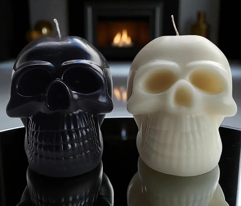Halloween skull candles and pumpkins