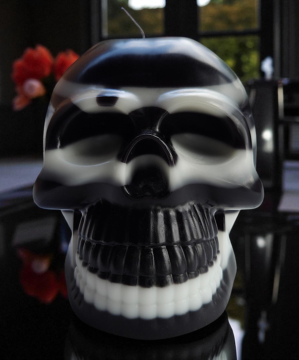 Ebony & Ivory Halloween skull candles and pumpkins. The beauty of black and white.