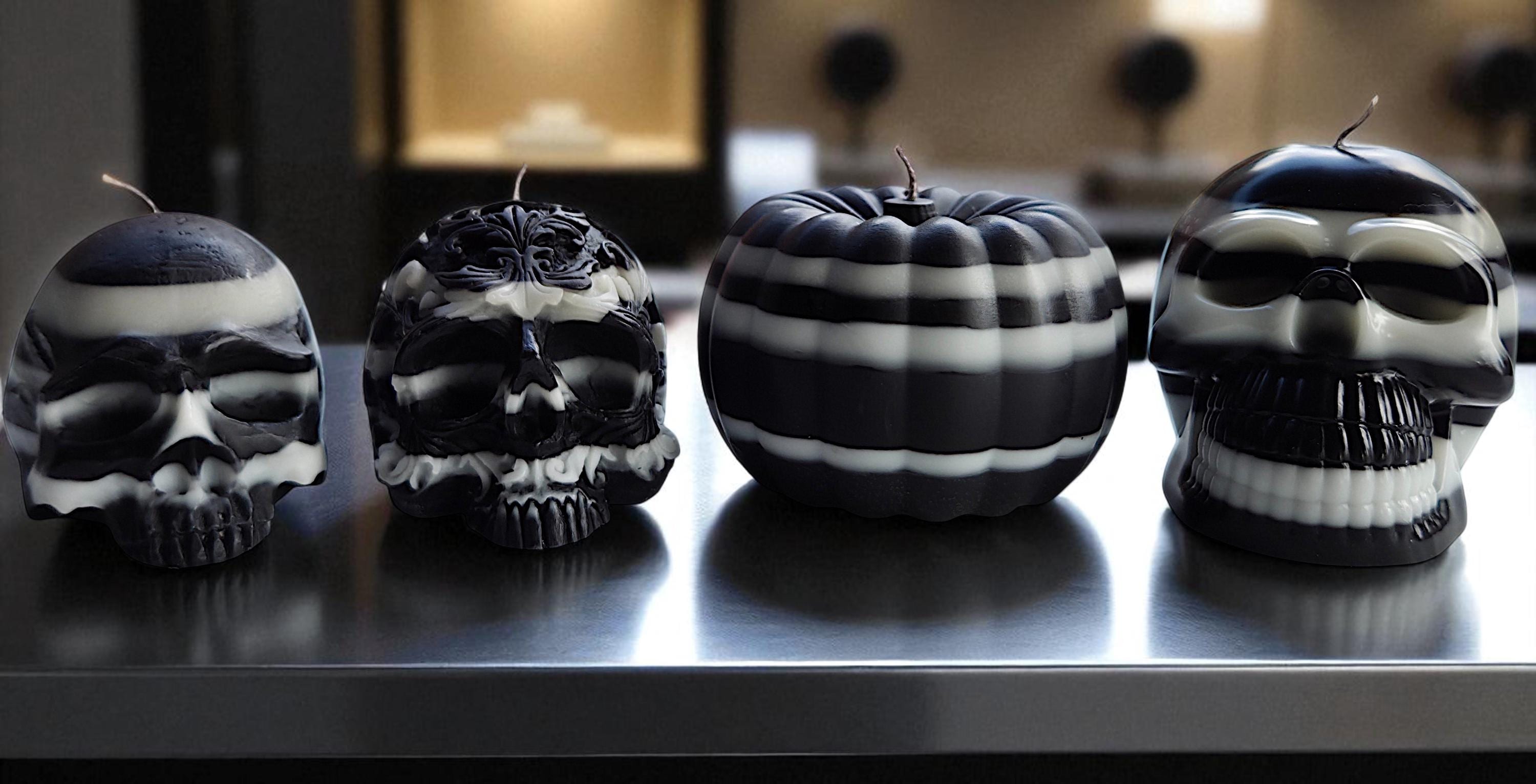 Ebony & Ivory Halloween skull candles and pumpkins. The beauty of black and white.