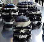 Ebony & Ivory Halloween skull candles and pumpkins. The beauty of black and white.