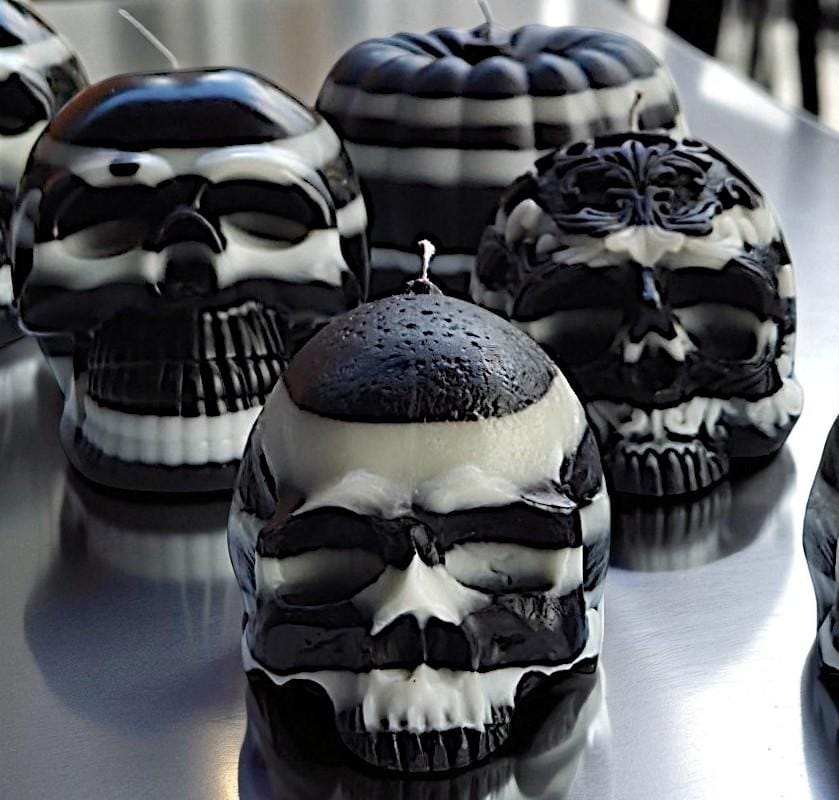 Ebony & Ivory Halloween skull candles and pumpkins. The beauty of black and white.