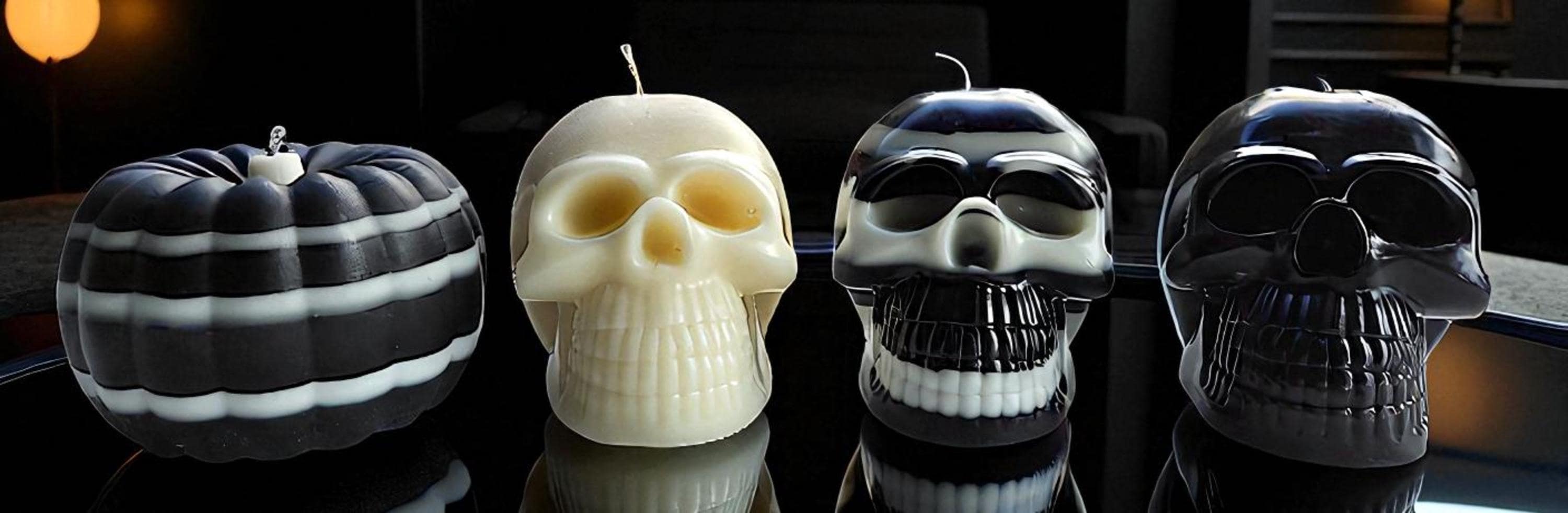 Ebony & Ivory Halloween skull candles and pumpkins. The beauty of black and white.