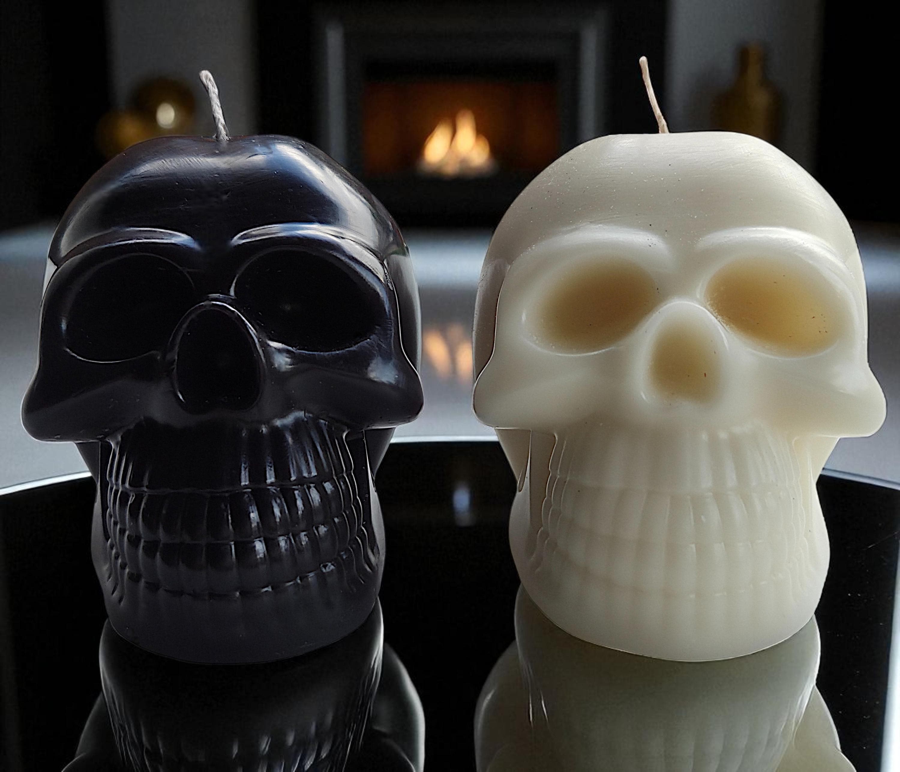Ebony & Ivory Halloween skull candles and pumpkins. The beauty of black and white.