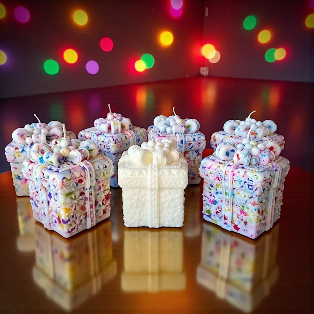 also available for $19.95 in 3 pristine shades of white on my site https://www.etsy.com/listing/4394889479/large-grand-christmas-gift-box-candle