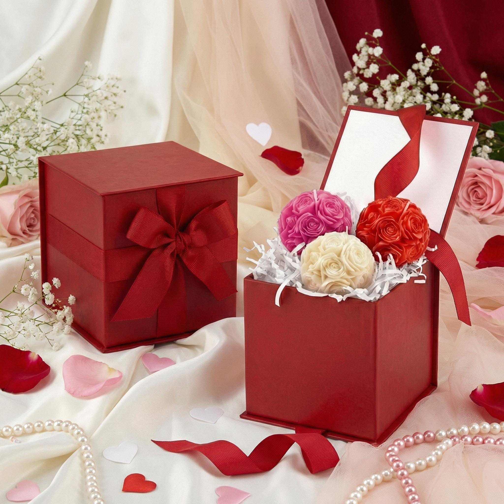 Upgrade your set of candles with this deluxe red Hallmark Gift Box for just $10.00 more. The perfect ready-to-give package. Box comes with bow and shredded filling -- exactly as shown.